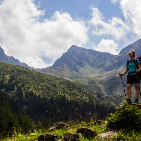 hiker posing in the Sambata valley located in the Fagaras mountains